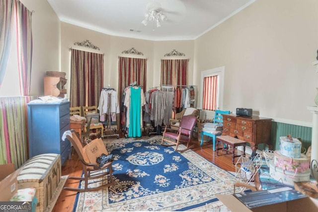 610 W Liberty, Claxton, GA 30417 - sitting room with ceiling fan, wood-type flooring, and crown molding