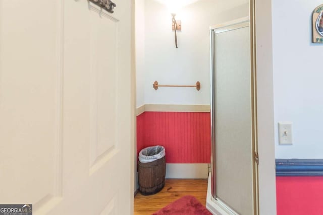 610 W Liberty, Claxton, GA 30417 - bathroom featuring hardwood / wood-style floors and walk in shower