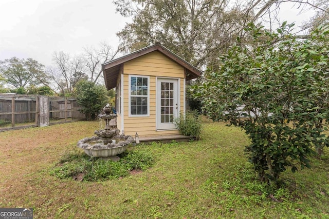 610 W Liberty, Claxton, GA 30417 - view of outbuilding featuring a lawn