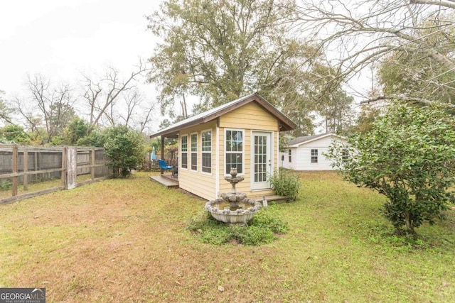 610 W Liberty, Claxton, GA 30417 - exterior space with a yard and an outdoor structure