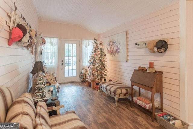 610 W Liberty, Claxton, GA 30417 - sitting room with wooden walls, vaulted ceiling, and hardwood / wood-style flooring
