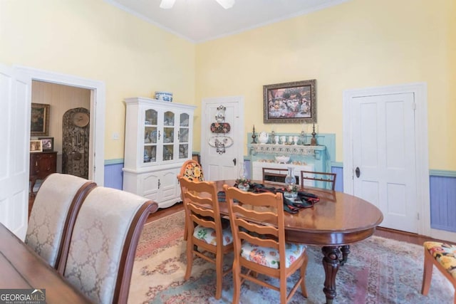 610 W Liberty, Claxton, GA 30417 - dining room with ceiling fan, hardwood / wood-style floors, and crown molding