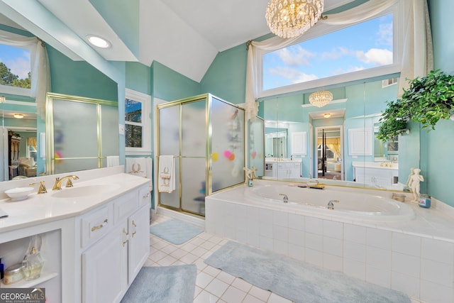 bathroom with tile patterned floors, vanity, lofted ceiling, and independent shower and bath