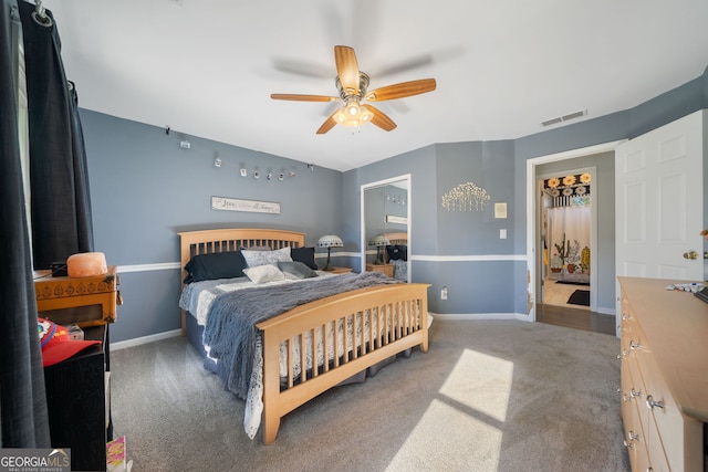 carpeted bedroom featuring ceiling fan