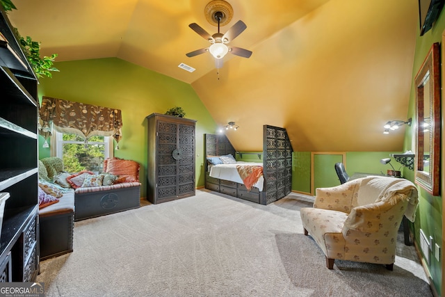 bedroom featuring light carpet, vaulted ceiling, and ceiling fan