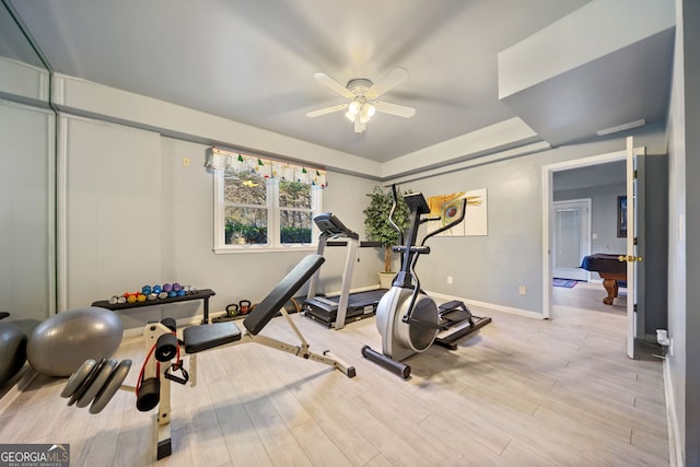 workout area featuring ceiling fan, pool table, and light wood-type flooring