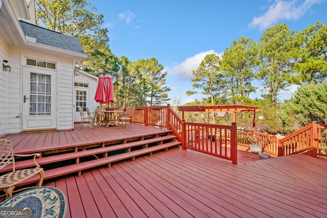 wooden deck with a pergola