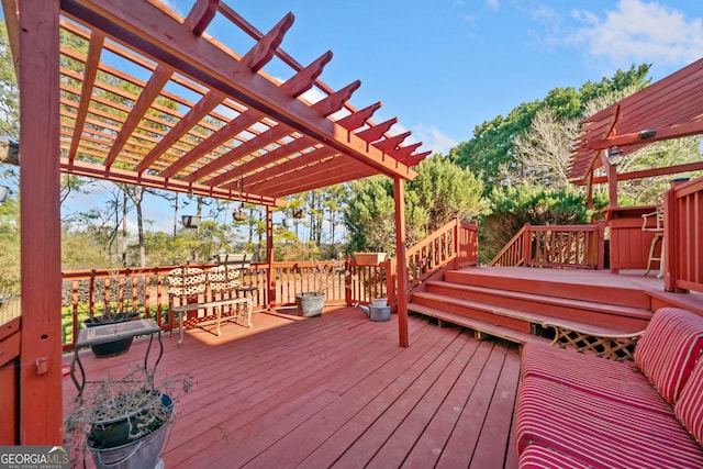 wooden terrace with a pergola