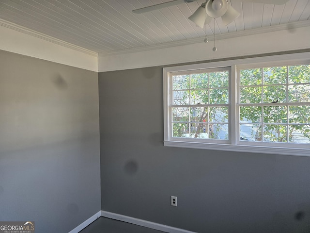 spare room with ceiling fan and ornamental molding