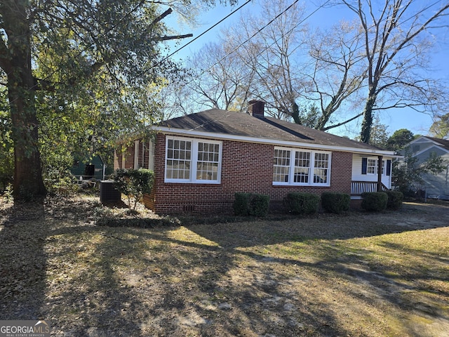 view of property exterior featuring a yard