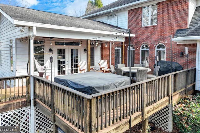 deck with a grill and french doors