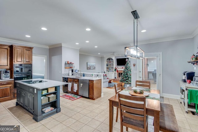 kitchen featuring pendant lighting, double wall oven, stainless steel dishwasher, ornamental molding, and a kitchen island