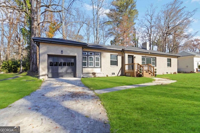 single story home featuring a garage and a front lawn