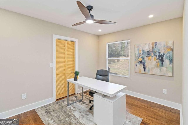 home office featuring ceiling fan and wood-type flooring