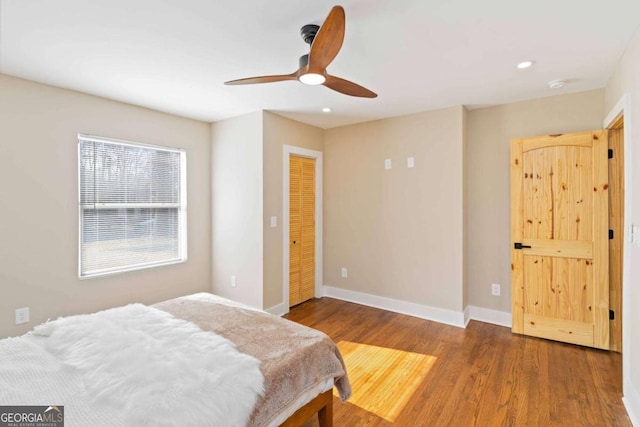 office area with ceiling fan and hardwood / wood-style flooring