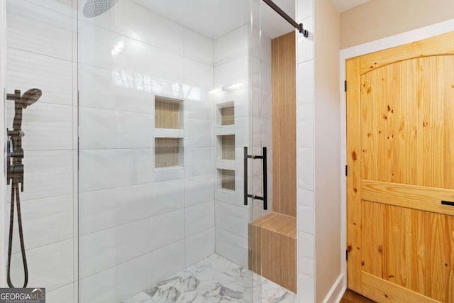 bathroom featuring an enclosed shower