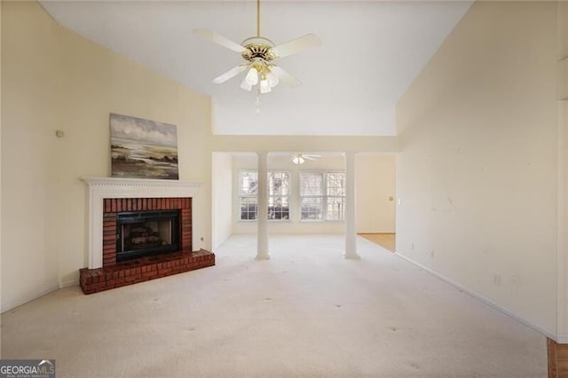 unfurnished living room featuring ceiling fan, light carpet, lofted ceiling, and a brick fireplace