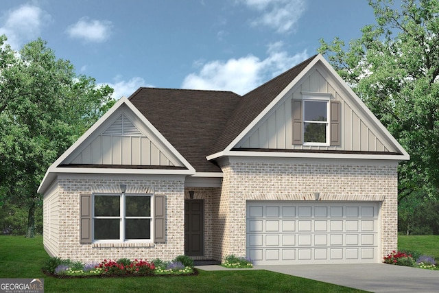 view of front of home featuring a front yard and a garage