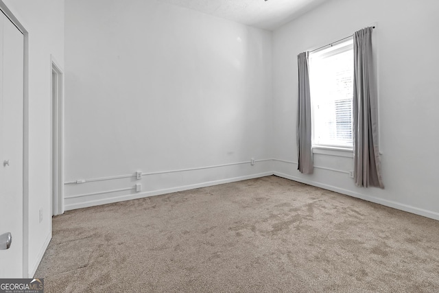 view of carpeted spare room