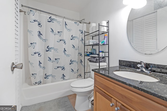 full bathroom with tile patterned flooring, vanity, shower / tub combo, and toilet