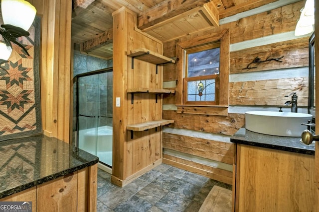 bathroom with vanity, wood ceiling, walk in shower, and wooden walls