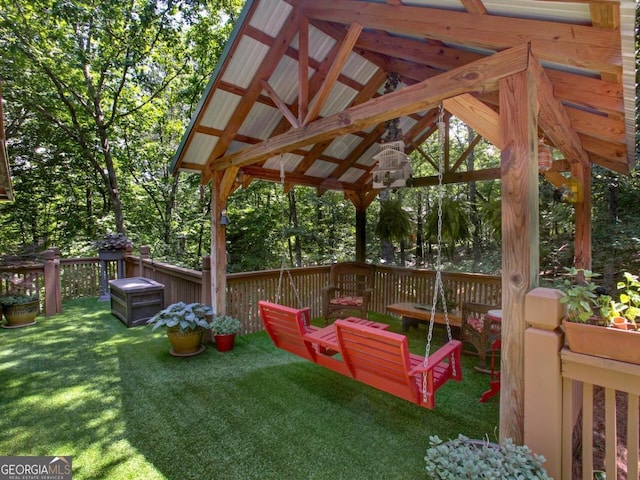 exterior space with a gazebo and a lawn