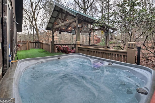 view of pool featuring a hot tub