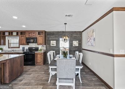 dining area featuring crown molding and a chandelier