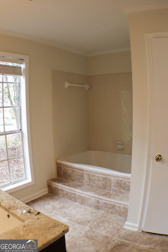 bathroom with vanity and ornamental molding