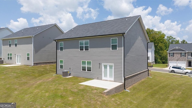 back of house featuring a patio area, a yard, and cooling unit