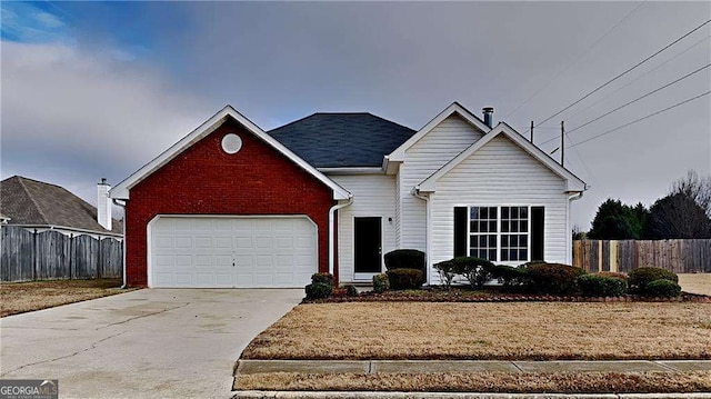 view of front of property with a garage