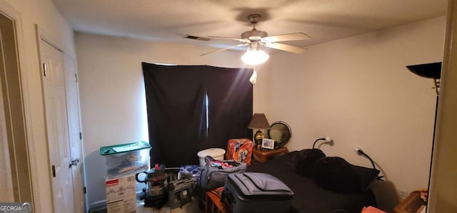 bedroom featuring ceiling fan