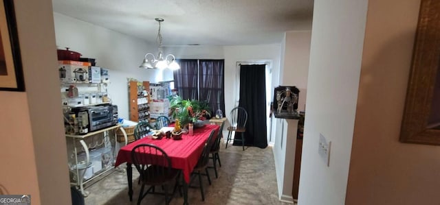 dining room featuring an inviting chandelier