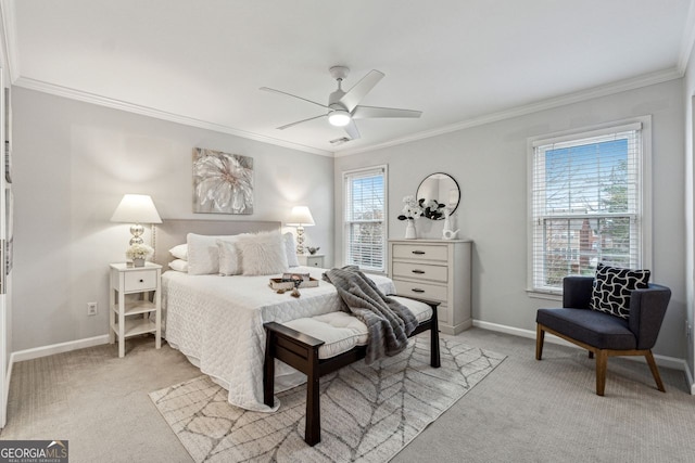 carpeted bedroom featuring ceiling fan, crown molding, and multiple windows