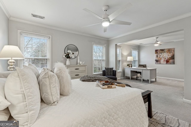 bedroom featuring ceiling fan, ornamental molding, light carpet, and multiple windows