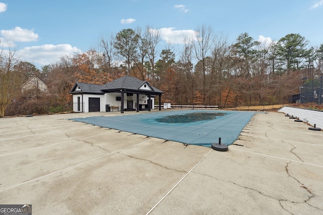 view of swimming pool featuring a patio