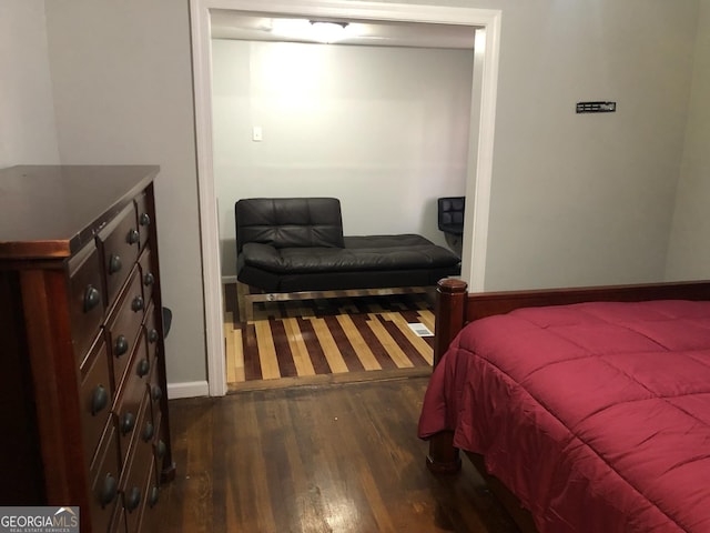 bedroom featuring dark hardwood / wood-style floors