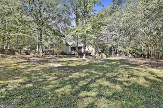 view of yard featuring a deck