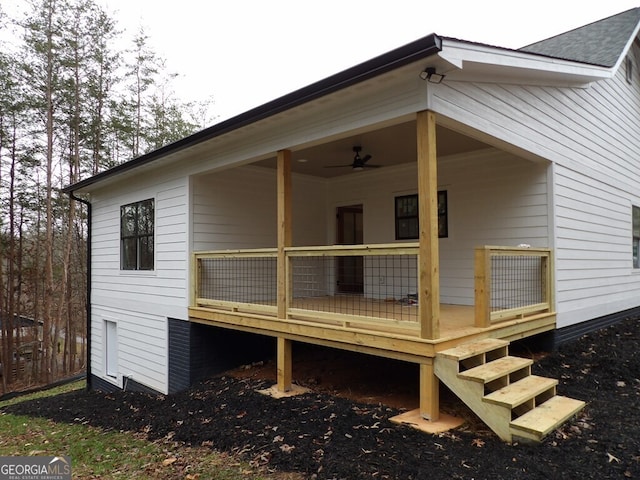 view of property exterior featuring ceiling fan