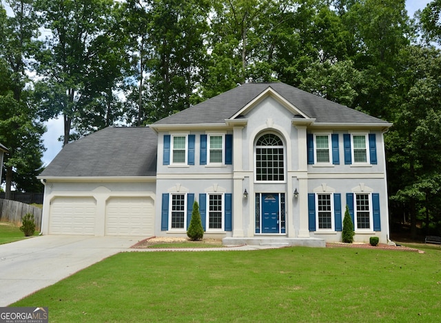 2105 Bentbrooke Trl, Lawrenceville, GA 30043 - colonial inspired home with a front yard and a garage
