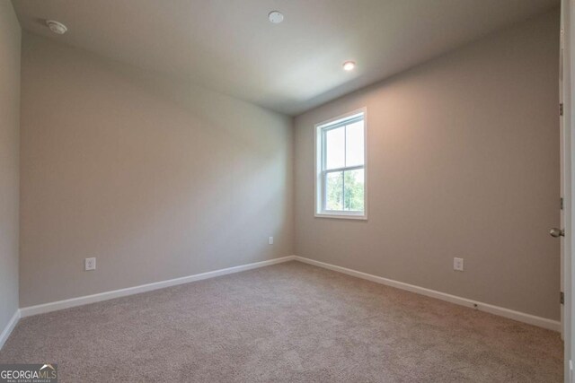 view of carpeted spare room