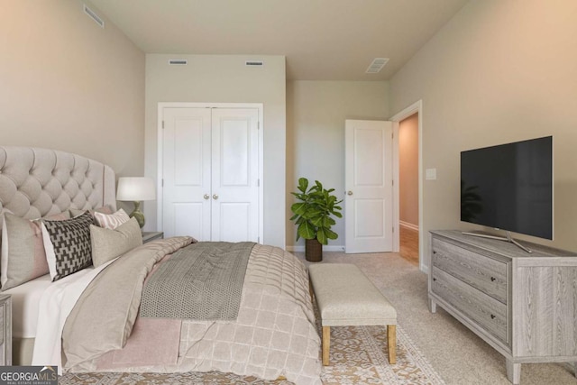 carpeted bedroom featuring a closet