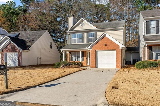 front of property with a garage