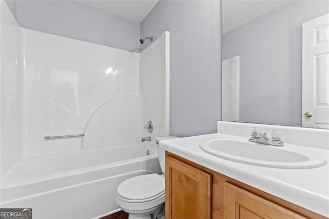 full bathroom featuring vanity, toilet, and tub / shower combination