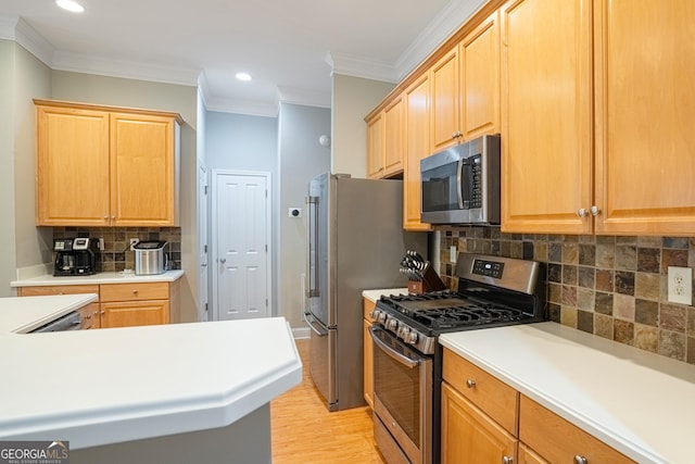 kitchen with decorative backsplash, crown molding, light wood-type flooring, and stainless steel appliances