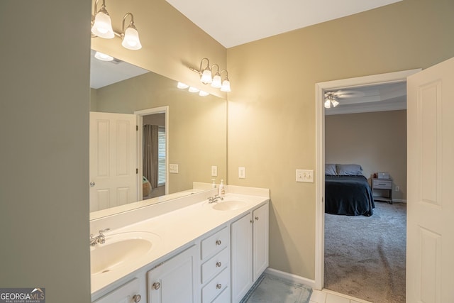 bathroom featuring vanity, ceiling fan, and crown molding