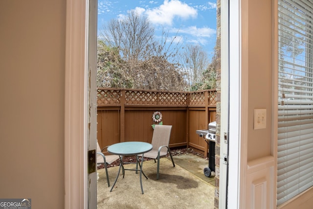 balcony featuring a grill and a patio area