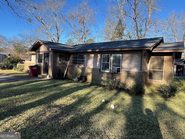 view of property exterior featuring a lawn