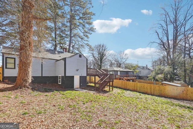 view of yard featuring a deck