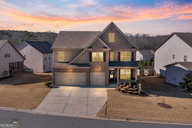 view of front of property with a garage